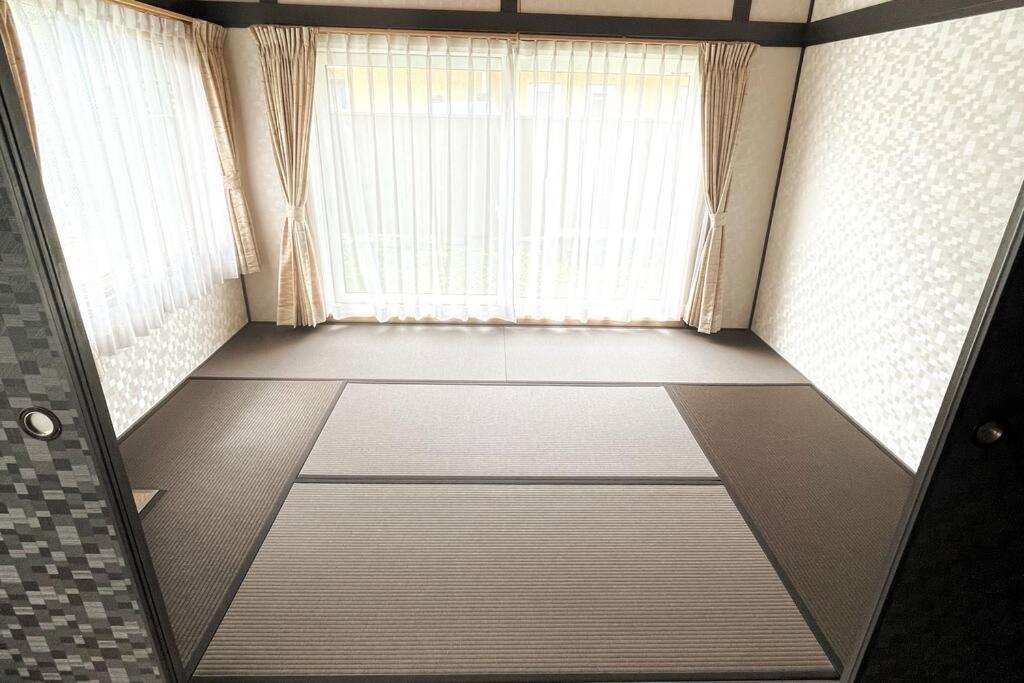【ウポポイ近く】庭付きログハウステイスト・ Bbqセットあり 4名様まで同一料金 Shiraoi Esterno foto